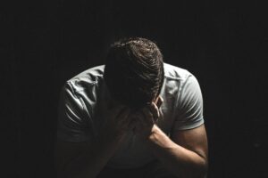 A person experiencing the effects of trauma on his life.